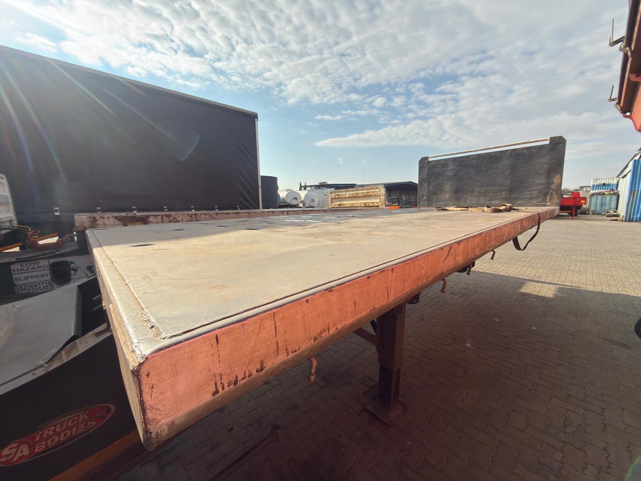 2004 SA TRUCK BODIES SUPER LINK FLAT DECK TRAILER (CS265)