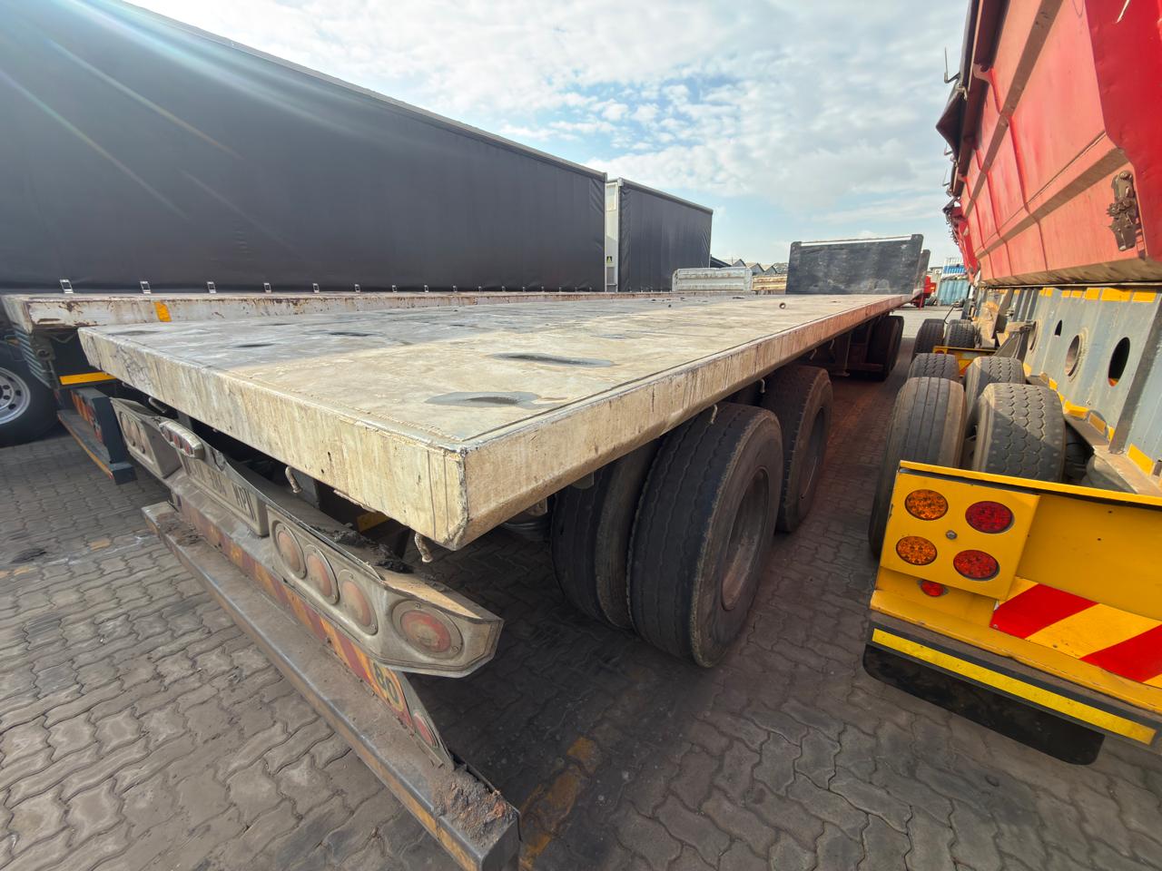 2004 SA TRUCK BODIES SUPER LINK FLAT DECK TRAILER (CS265)