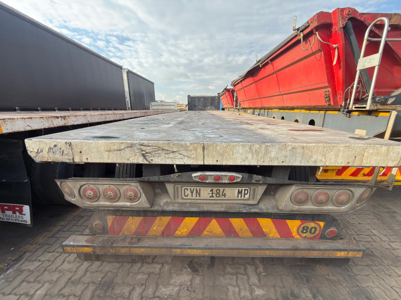 2004 SA TRUCK BODIES SUPER LINK FLAT DECK TRAILER (CS265)